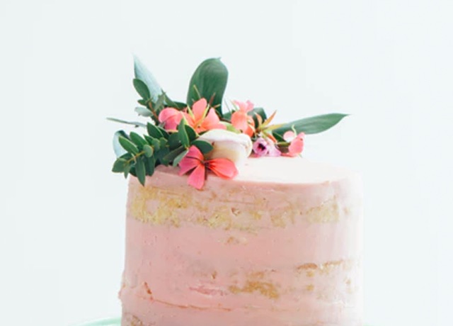 pink cake with flower toppings